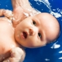 Swimming infants in age between 0-6 months