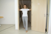 Chest muscle stretching in a doorway